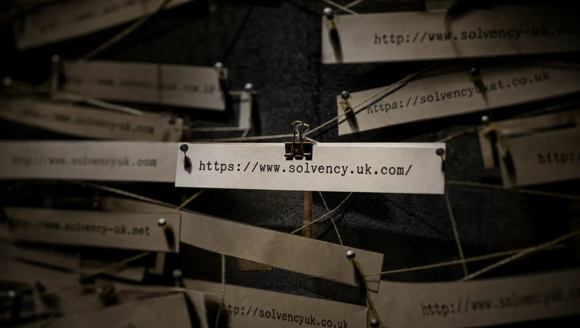 A clean URL strip is clipped in front of tangled URL threads, showing the main version a canonical tag should point to.