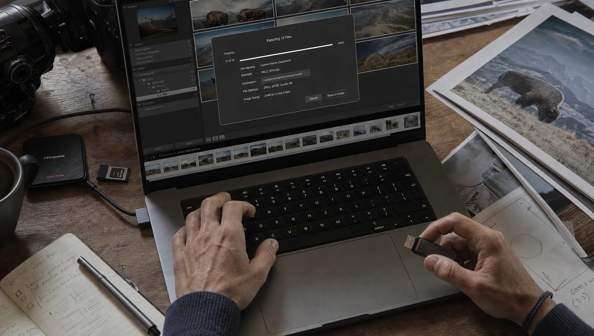 Hands check resized website images on a workstation while preparing files for better SEO.